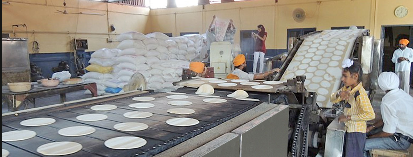 Gic-background Roti making machine